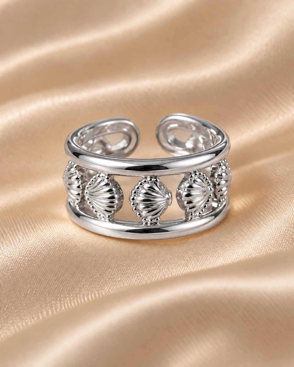 Anillo conchas plateado